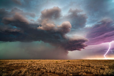 Lightning strikes from a supercell thunderstorm near roswell, new mexico.