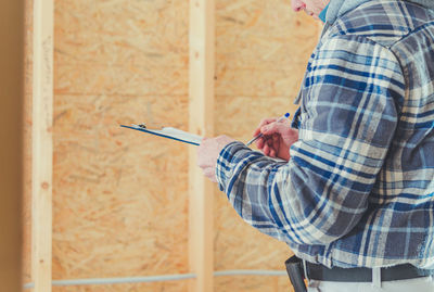 Man working on wall