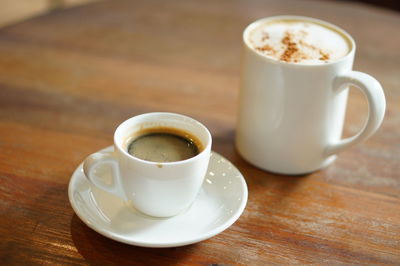 Close-up of coffee cup on table