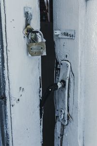 Close-up of padlock on door