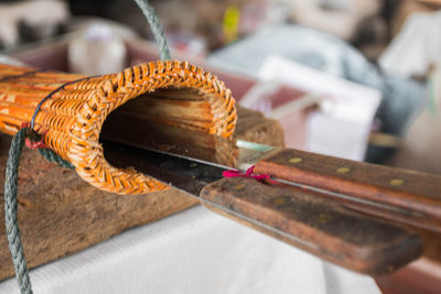 2 cooking knives and a wooden knife bag