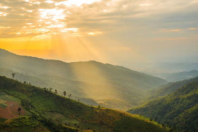 Scenic view of landscape against sky during sunset