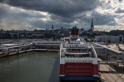 High angle view of city against cloudy sky