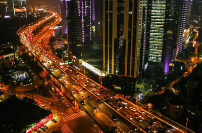 High angle view of illuminated cityscape at night