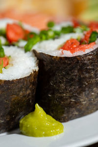 Close-up of served food in plate