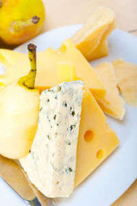 Selection of cheese and fresh pears appetizer snack