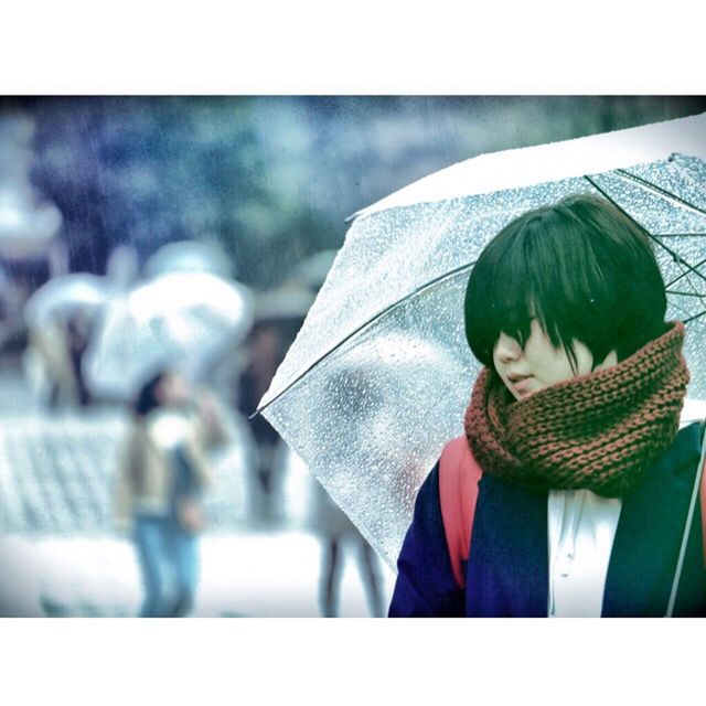 auto post production filter, transfer print, protection, clothing, real people, one person, winter, focus on foreground, umbrella, day, standing, close-up, incidental people, warm clothing, security, lifestyles, unrecognizable person, headshot, outdoors, rain, scarf, obscured face