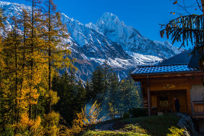 Scenic view of snowcapped mountains during autumn