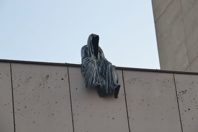 Low angle view of sculpture against clear sky