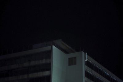 Exterior of building against clear sky at night