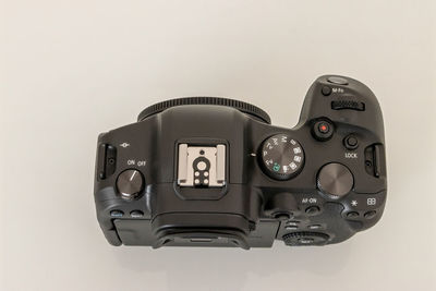 Close-up of camera on white background