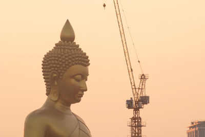 The giant golden buddha in wat paknam phasi charoen temple in phasi charoen district