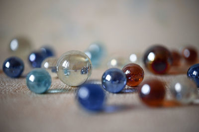 Close-up of multi colored balls on table