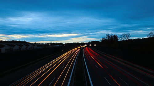 Light trails on road at night