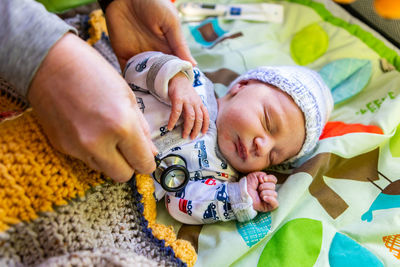 Cute baby lying on bed