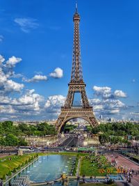 Tower in city against sky