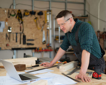 Young man working at table