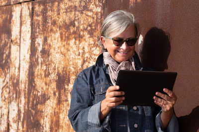 Young woman using mobile phone