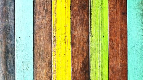 Full frame shot of multi colored wooden plank