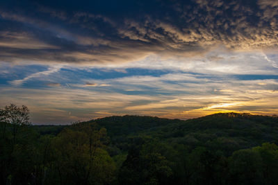 Scenic view of dramatic sky over landscape