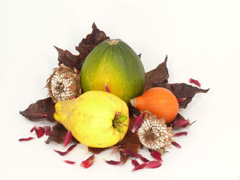 Close-up of fresh fruit on white background