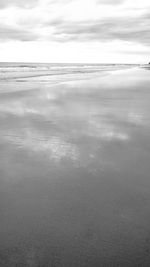 Scenic view of calm sea against sky