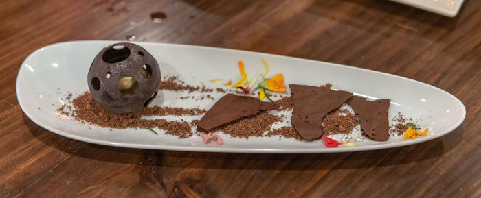 High angle view of cake in plate on table