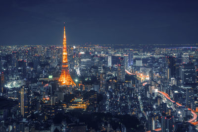 Illuminated buildings in city at night