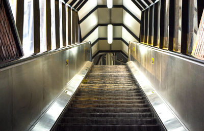 Low angle view of empty escalator at subway station