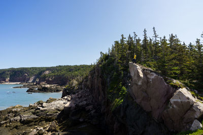 Scenic view of rocks against clear sky