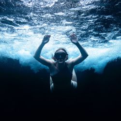 Woman diving in sea