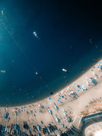 High angle view of city by sea