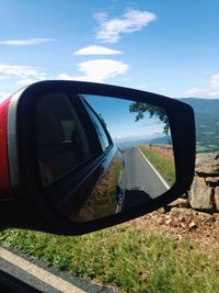 Cropped image of car on road