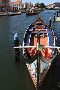 Boat moored at harbor