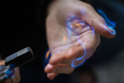 Close-up of hands using mobile phone