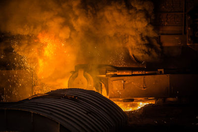 Fire in factory at night