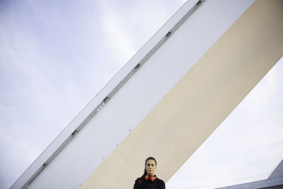 Low angle view of woman against sky