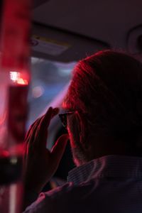 Close-up of man sitting in car