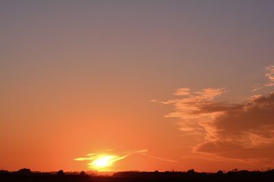 Low angle view of dramatic sky during sunset