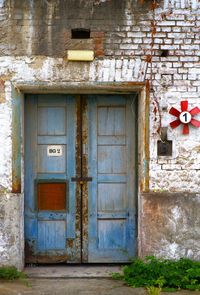 Closed door of abandoned house