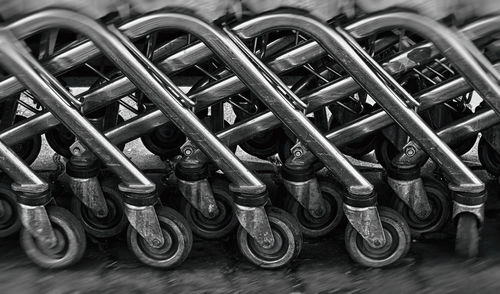 Close-up side view of shopping trolleys