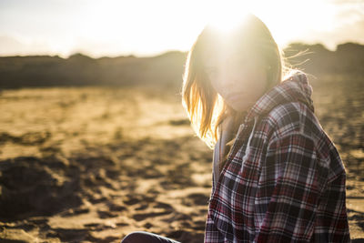 Portrait of woman during sunny day