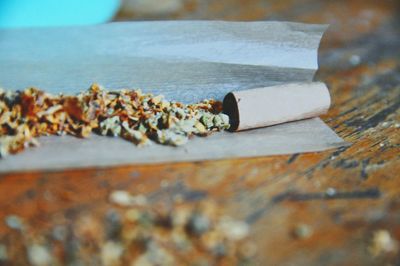 Close-up of cigarette on table