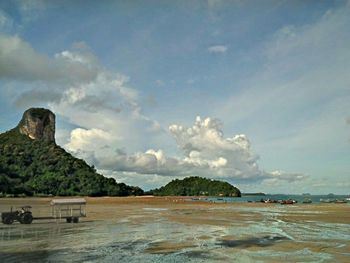 Scenic view of sea against cloudy sky