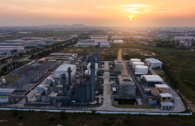 Aerial view oil terminal is industrial facility for storage of oil and petrochemical. 