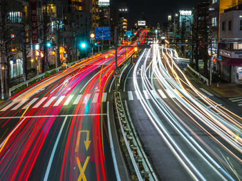 High angle view of light trails on road at night