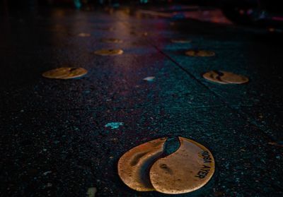 Close-up of metal ring on street