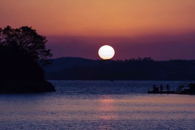 View of calm sea at sunset