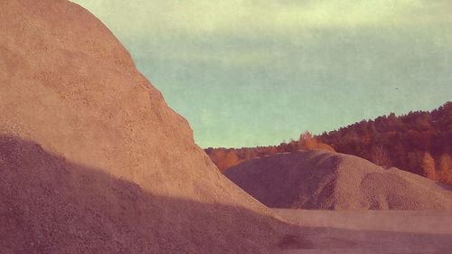 View of rocky mountain against the sky