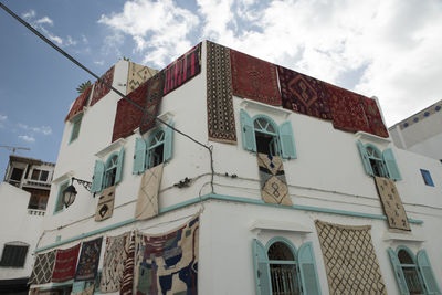 Low angle view of residential building against sky